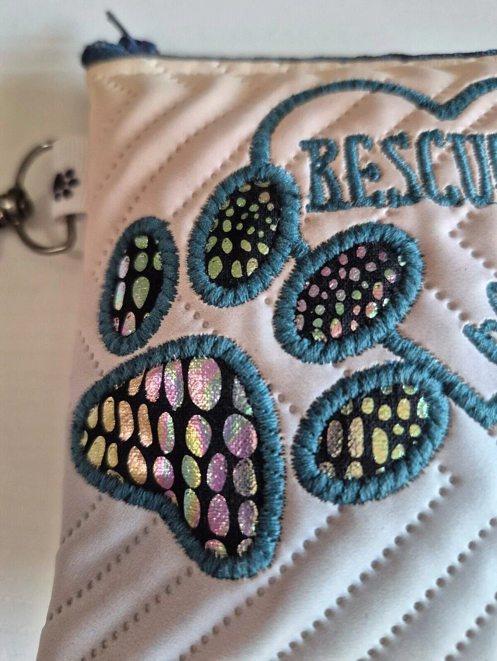 Embroidered rescue mum and dog paw print dog poop bag with gormmet and clasp